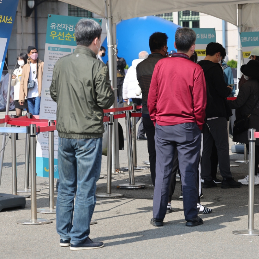 S. Korea's new COVID-19 cases above 50,000 for 2nd day amid 'twindemic' worries