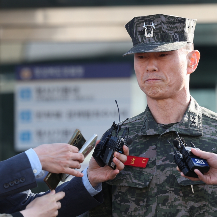 Ex-Marine division chief returns home after 22-hr questioning over conscript's death