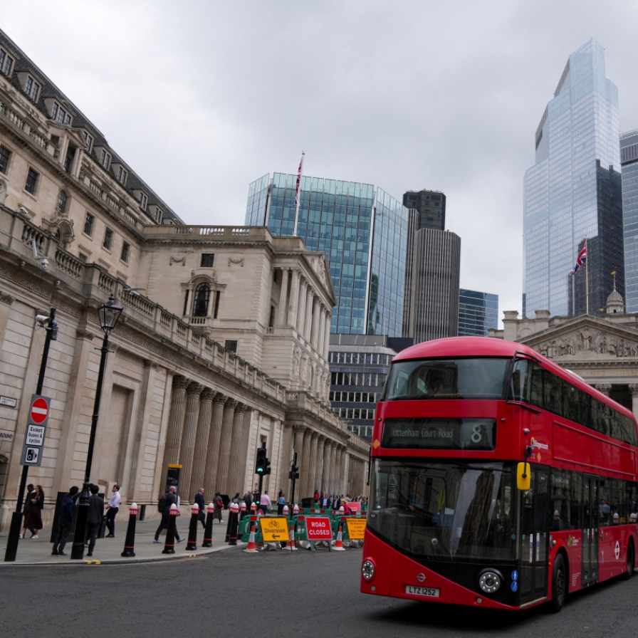 Bank of England cuts rates from 16-year high, 'careful' on future moves