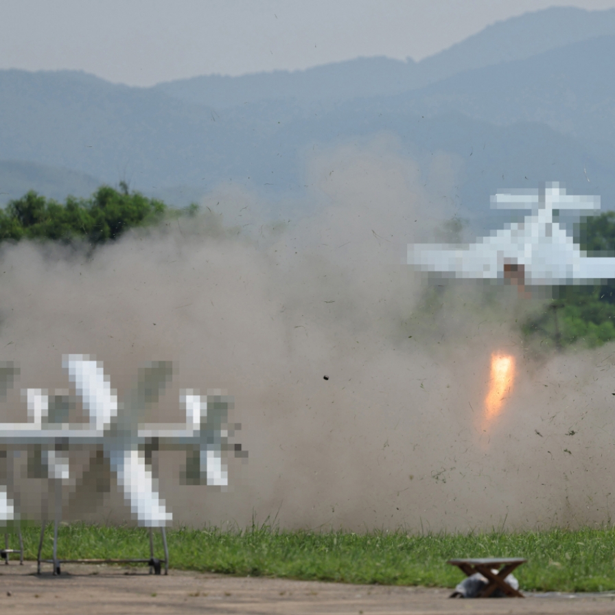 N. Korean leader oversees suicide drones test, calls for more production