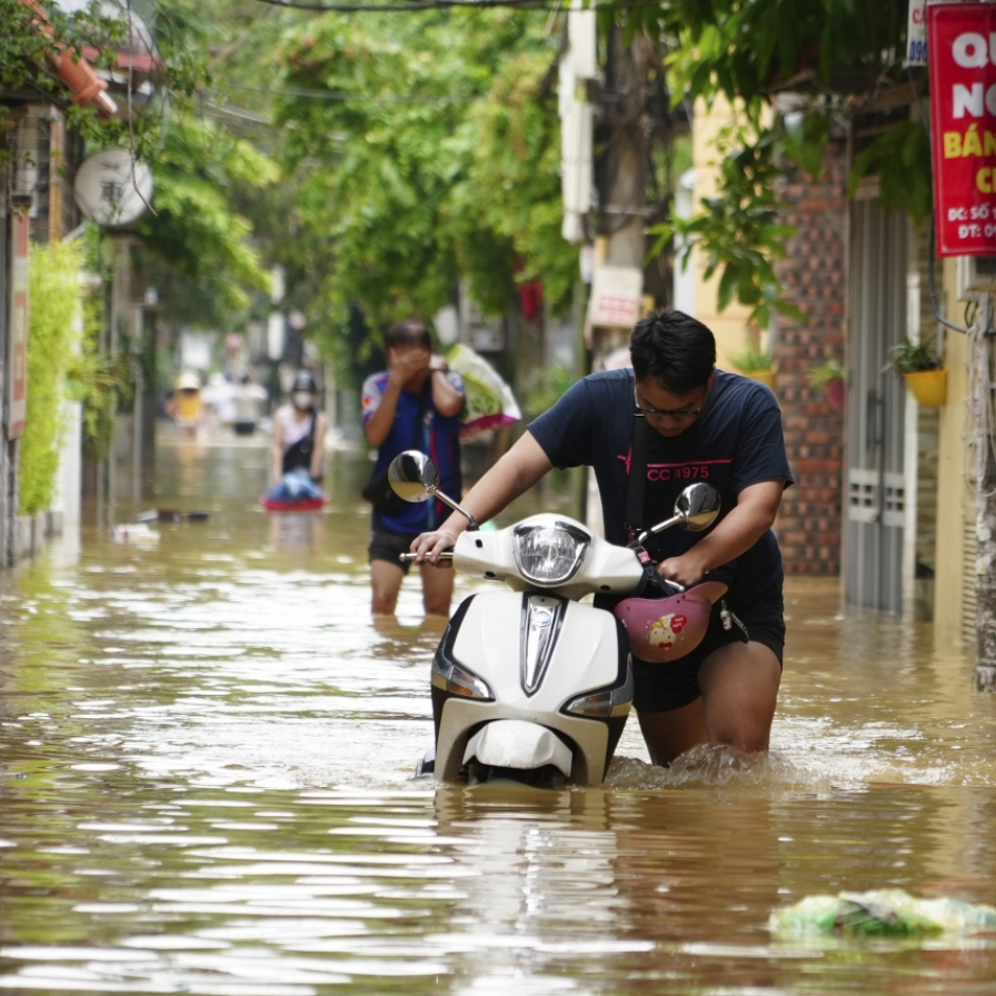 Vietnam typhoon death toll rises to 233 as more bodies found in areas hit by landslides and floods