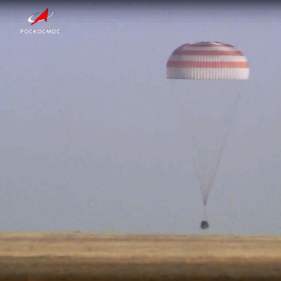 Soyuz capsule with 2 Russians and 1 American from the International Space Station returns to Earth