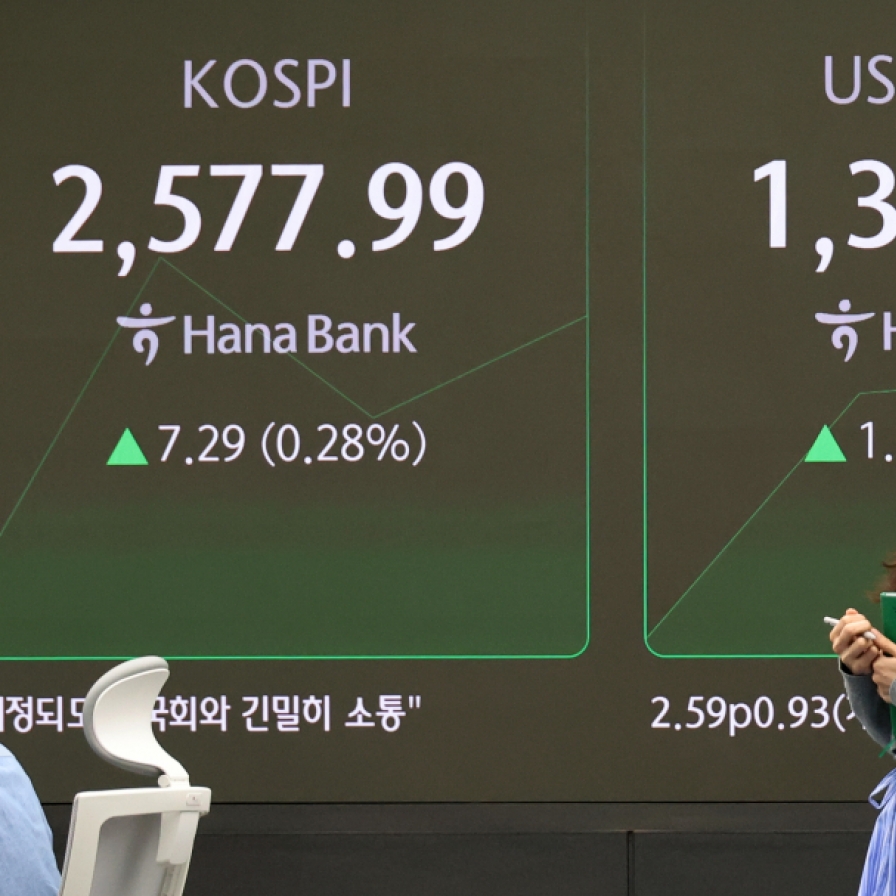 Seoul shares open higher on retail buying