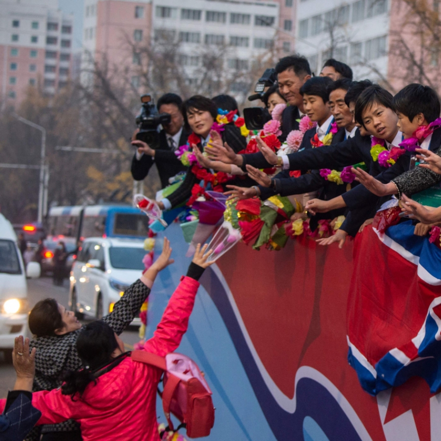 N. Korea's World Cup-winning footballers get heroes' welcome home