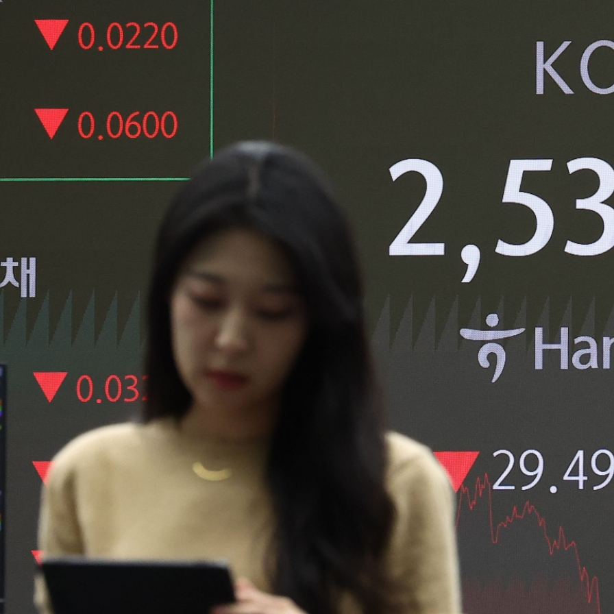 Seoul shares fall over 1% on chip slump amid US uncertainties