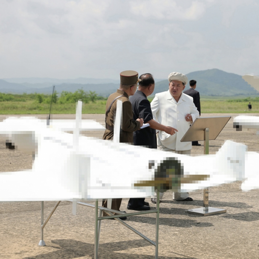 N. Korea's Kim orders mass production of suicide attack drones: KCNA