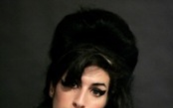 Coroner: Amy Winehouse died from too much alcohol