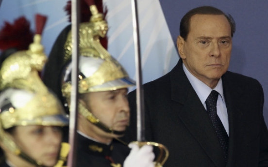 Italy's Berlusconi to resign after reforms pass