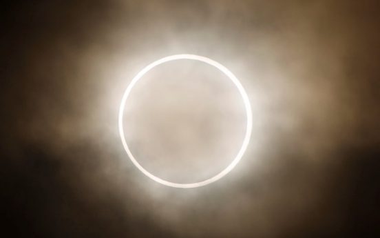 Partial solar eclipse dims sky