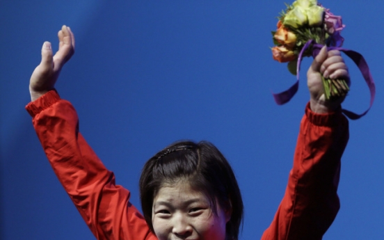 North Korean Rim wins women's -69kg weightlifting