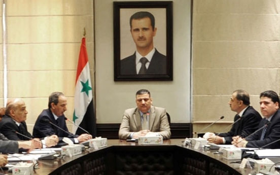 Syrian P.M. joins rebel side in latest blow to Assad