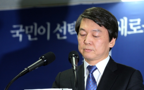 Independent Ahn withdraws from presidential race