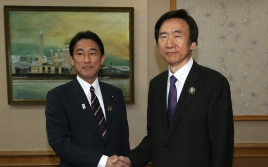 Korea, Japan ministers meet to mend ties