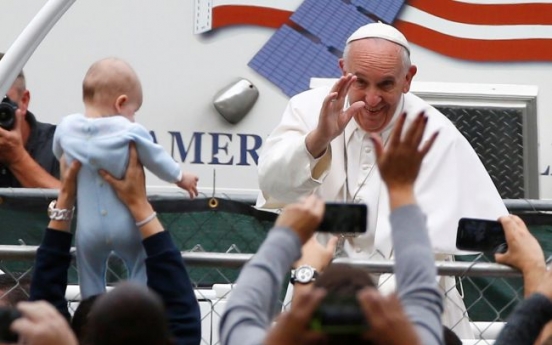 Pope Francis wraps up joyful U.S. visit with big open-air Mass