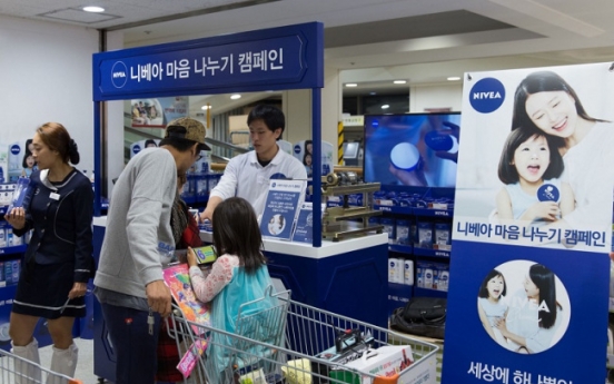 Nivea holds tin can cream photo engraving events