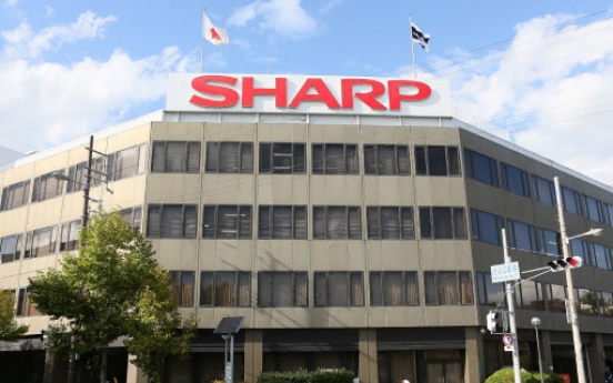 Sharp shares plunge as takeover thrown into question