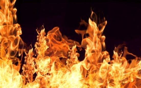 Woman attempts suicide by arson