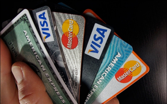Credit card firms mull legal action against Visa