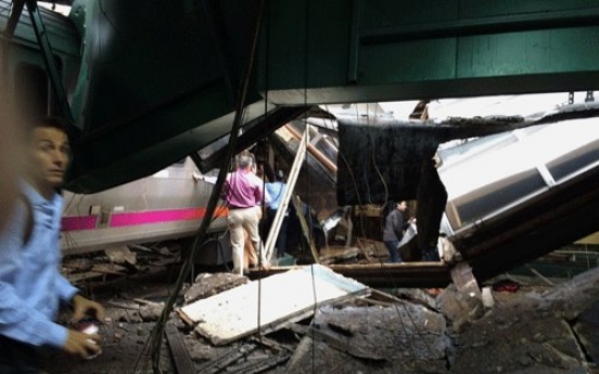 1 dead, over 100 hurt in train crash at New Jersey station