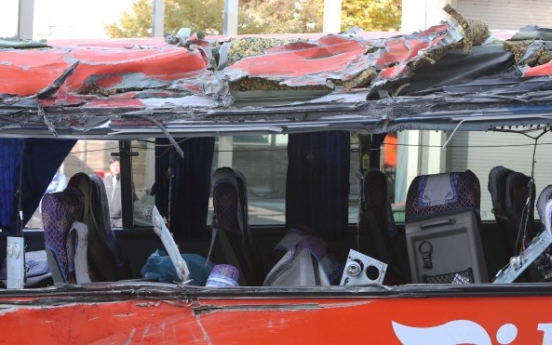 Tourist bus flips sideways, four passengers killed, some 40 injured