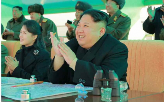 N. Korean leader, wife make appearance at air combat competition