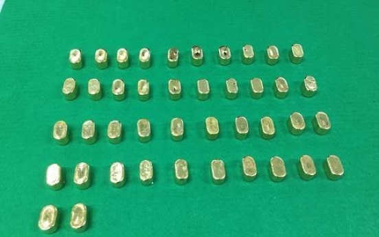 9 arrested for smuggling gold