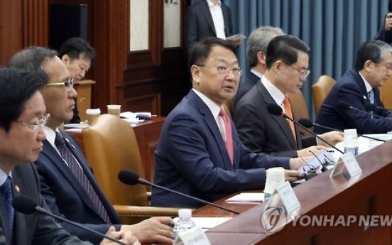 Korea's finance minister vows economic, diplomatic efforts to resolve tension with China