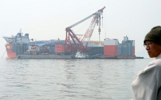 Salvage workers speed up preparation to get Sewol ready for transport