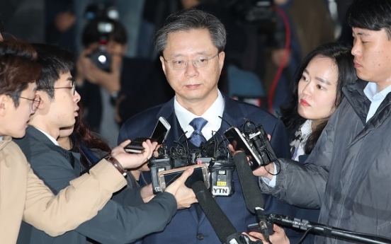 Woo questioned over corruption scandal