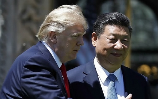 Trump defends decision to not label China currency manipulator to solve NK problem