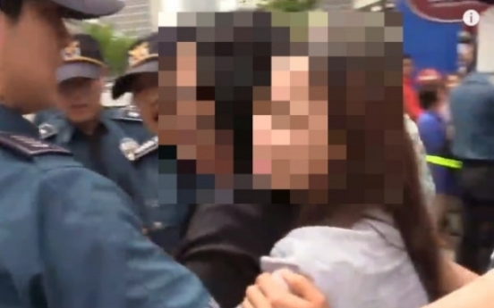 Woman arrested with knife at Hong campaign stop