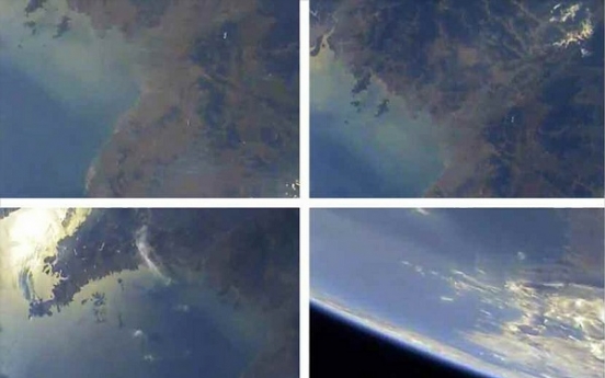 N. Korea unveils scores of earth photos taken from atmosphere