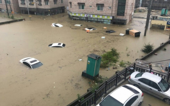 Heavy rain leaves at least 2 dead, 1 missing