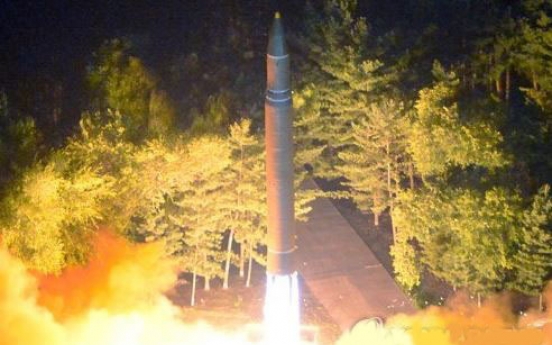 North Korea won't stop missile provocations: pro-NK paper