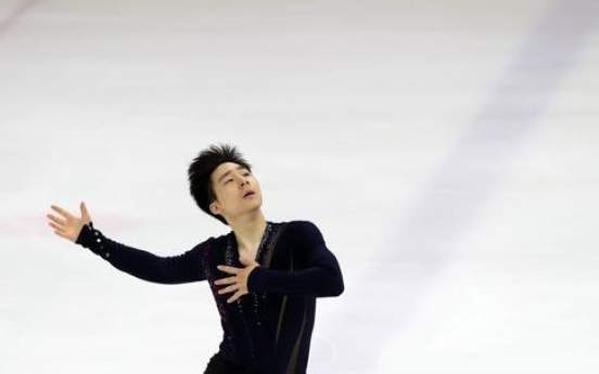 Ex-natl. figure skating champ headed to final Olympic qualifying event