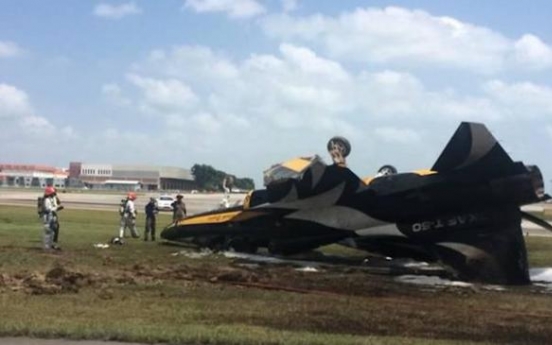 South Korean aircraft catches fire after skidding off runway at Singapore air show