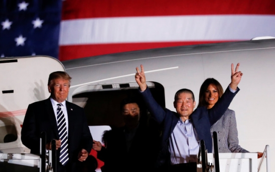 American prisoners released by N.Korea land in Washington