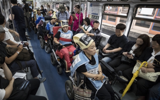 The disabled fight for right of mobility on Seoul subways