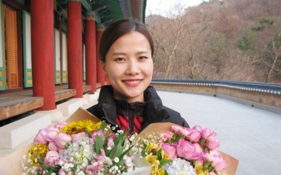 Korea’s ‘Garlic Girl’ curling champion marries skating coach