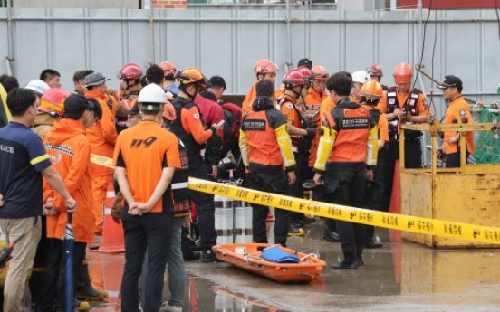 Heavy downpour kills one at construction site