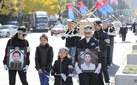 Funeral to be held for defector mother, son despite opposition from defector groups