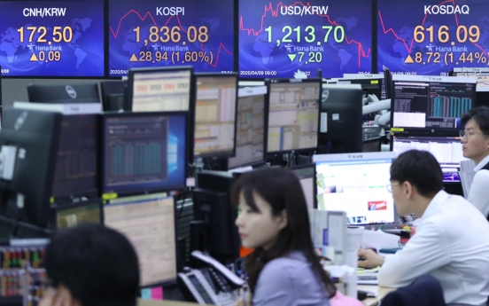 Seoul shares open higher on Wall Street gains