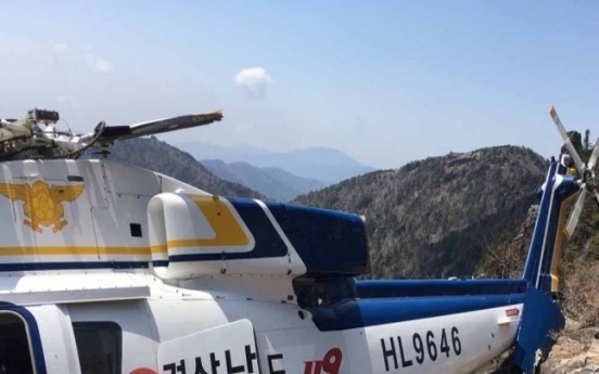 Firefighting helicopter with 7 aboard crashes