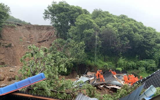 Downpours trigger landslide, cut off power, leave 2 dead in southern parts of Korea