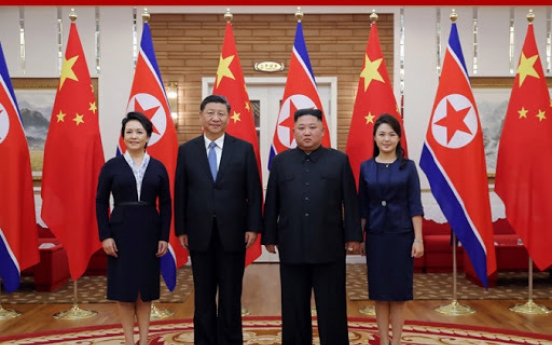 Kim and Xi highlight strong relations on treaty-signing anniversary