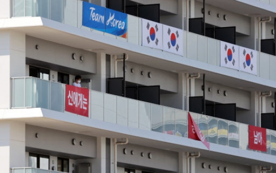 S. Korea takes down banners at athletes' village on IOC's request