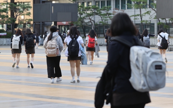 School children return to classrooms from summer vacations in middle of raging pandemic