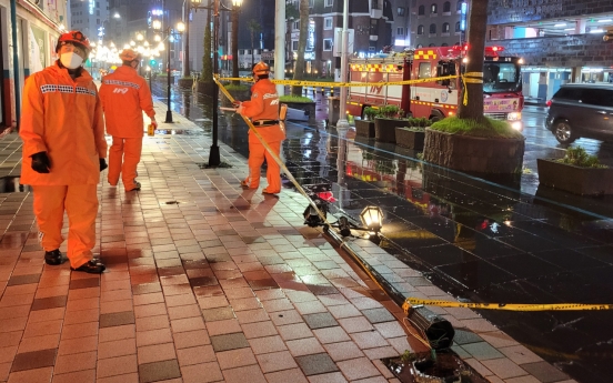 Typhoon Chanthu passes near Jeju, flooding roads, homes, canceling flights