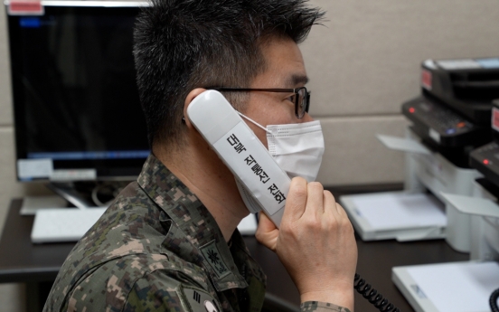 Two Koreas hold daily liaison, military calls after restoring communication lines