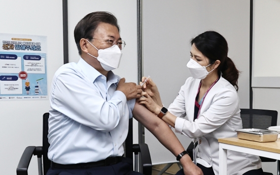 President Moon, first lady receive COVID-19 booster shots